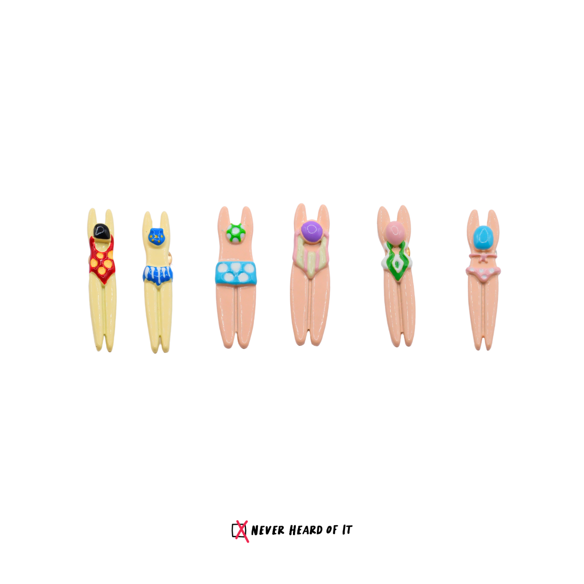 Splash Squad mismatched enamel swimmer stud earrings by Never Heard of It
