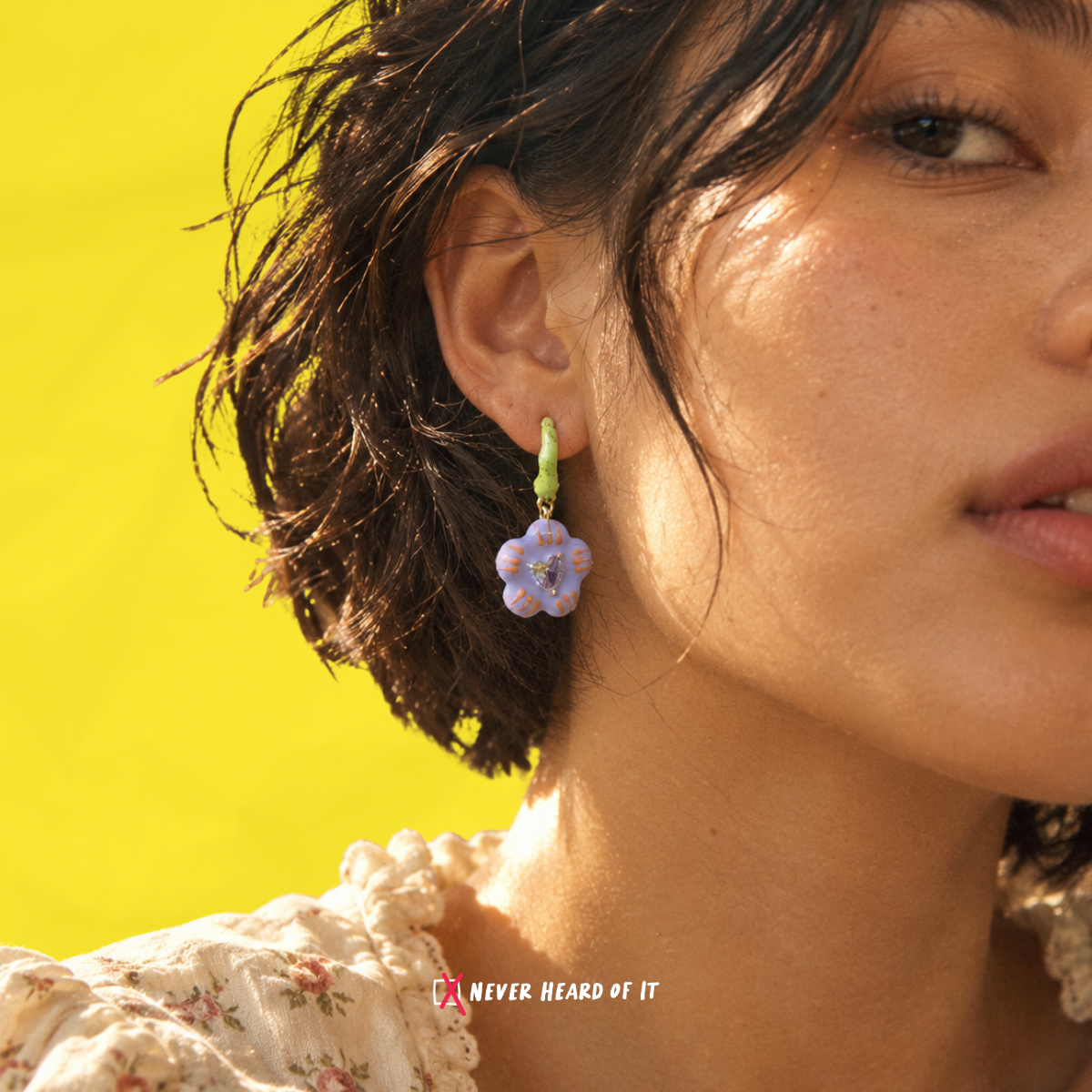 Purple Bloom Enamel Hoop Earrings — Purple Bloom worn on an ear