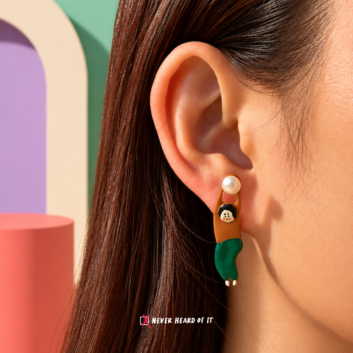She Holds the Moon Hand-Enamelled Stud — She Holds the Moon worn on an ear