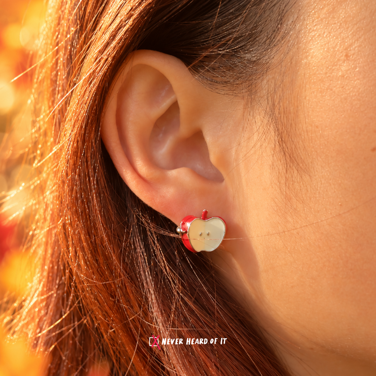 Sweet Poison Mismatched Enamel Studs — Apple's Better Half worn on an ear