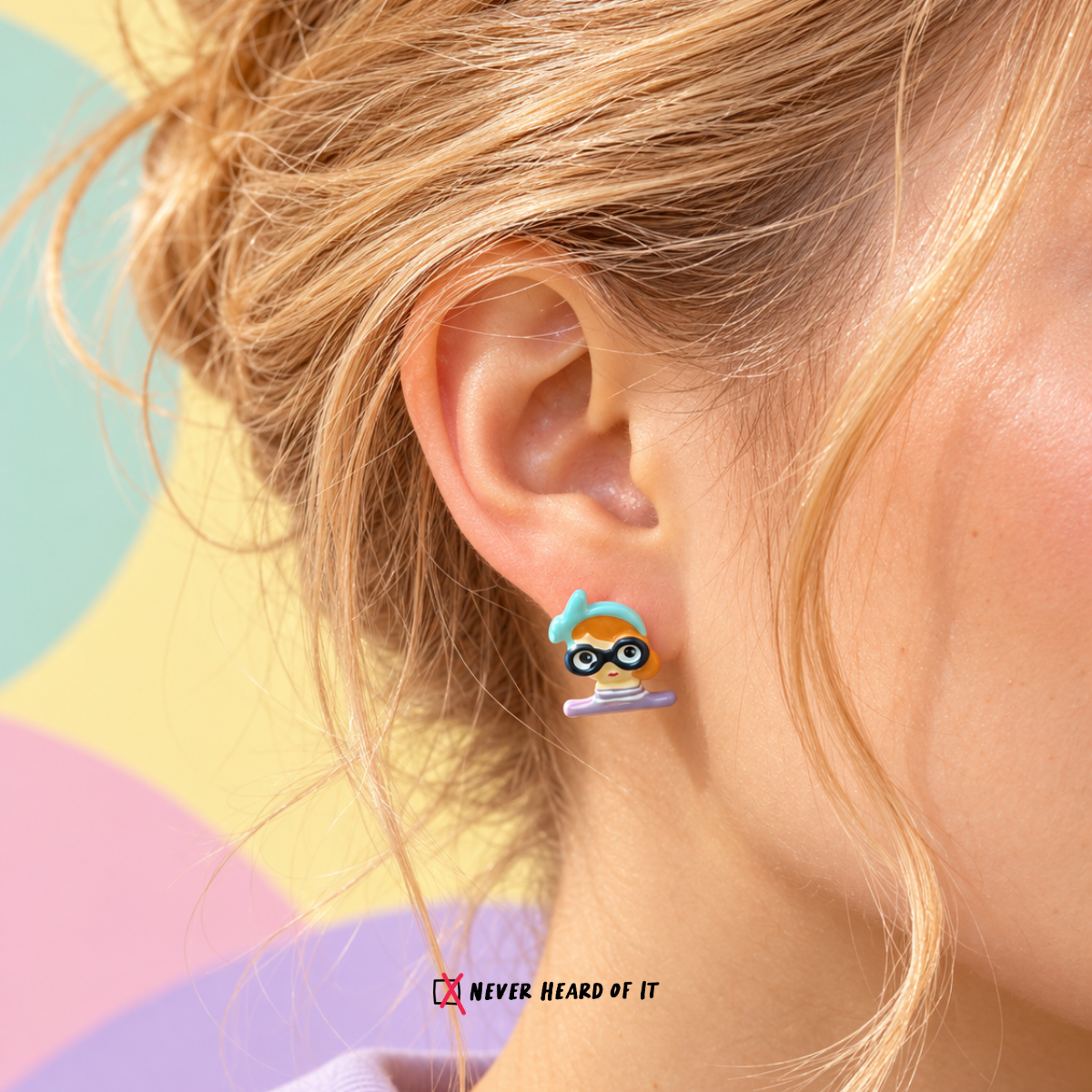 Big Eyes Club Mismatched Enamel Studs — Blue Hairband worn on an ear